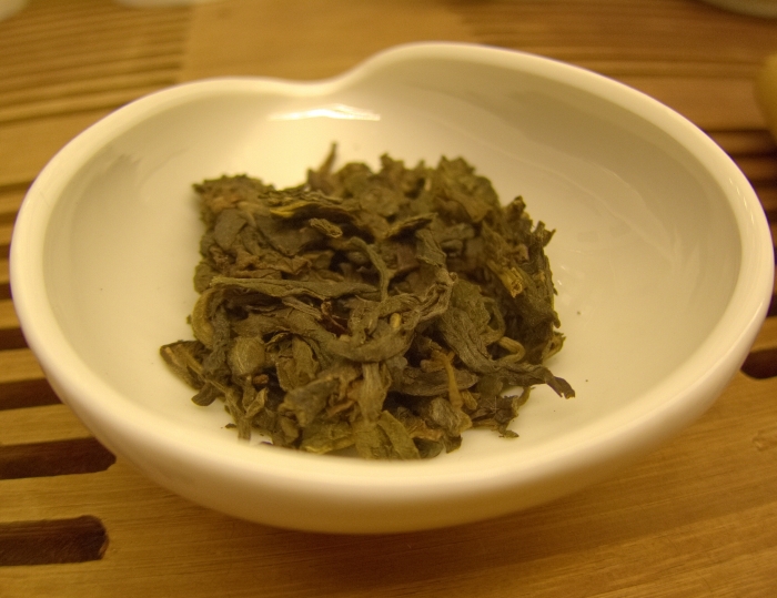 Tea leaves, Wu Liang Shan Sheng Puerh, at Tea Drunk. Owner Shunan Teng sources small batches of famous Chinese teas and her staff serves them Gong Fu style.