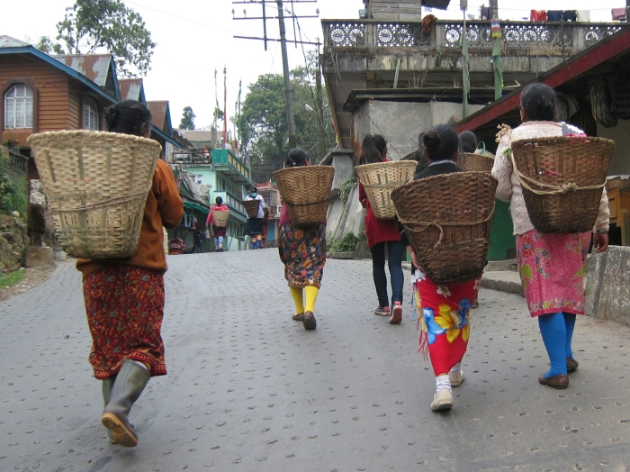 Tea pluckers returning home after a long day's work.